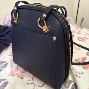 Miztique Blue Backpack with Textured Material and Gold Accents